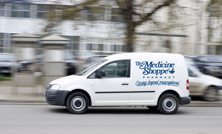 A delivery vehicle with the Medicine Shoppe logo on the side Delivery